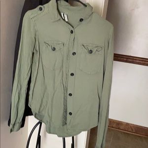 Green button up shirt.
